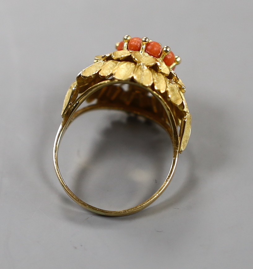 A continental yellow metal, coral bead and culture pearl cluster set dress ring, size R, gross weight 7 grams.